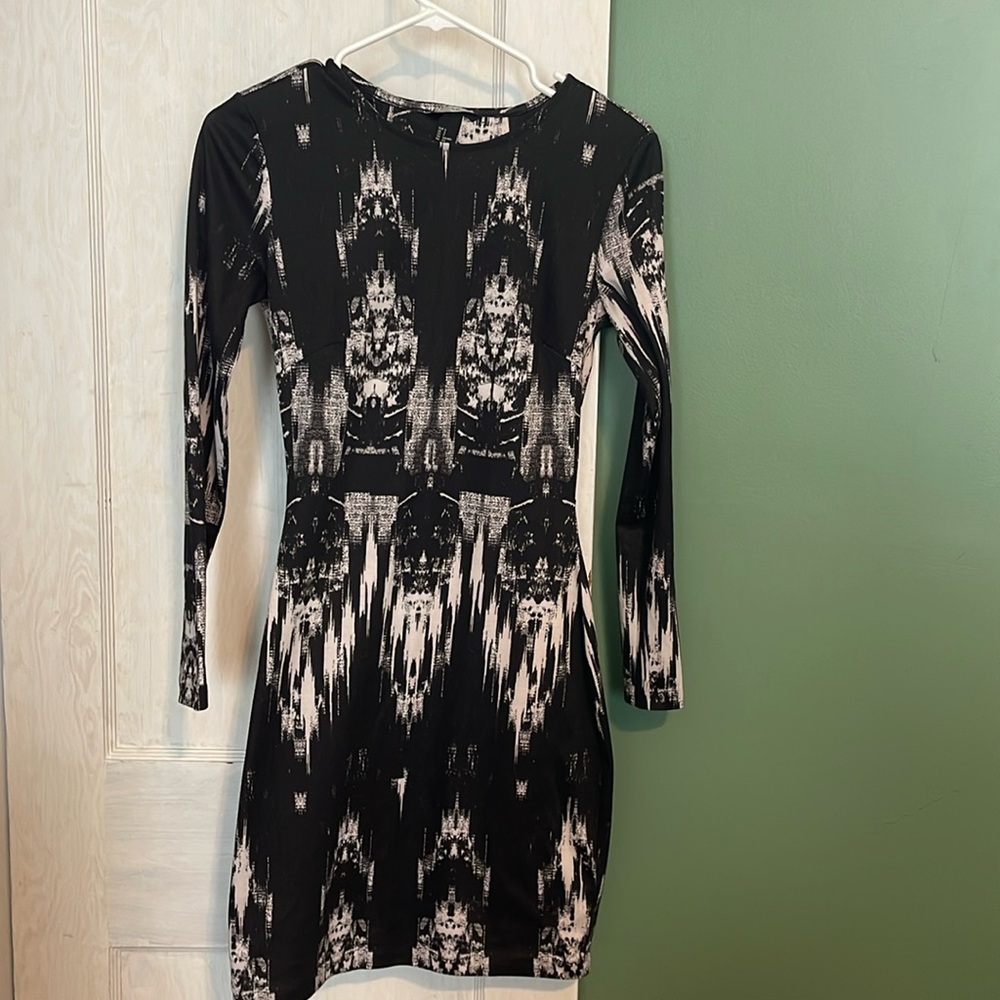 Black midi dress with opening slits in the back
